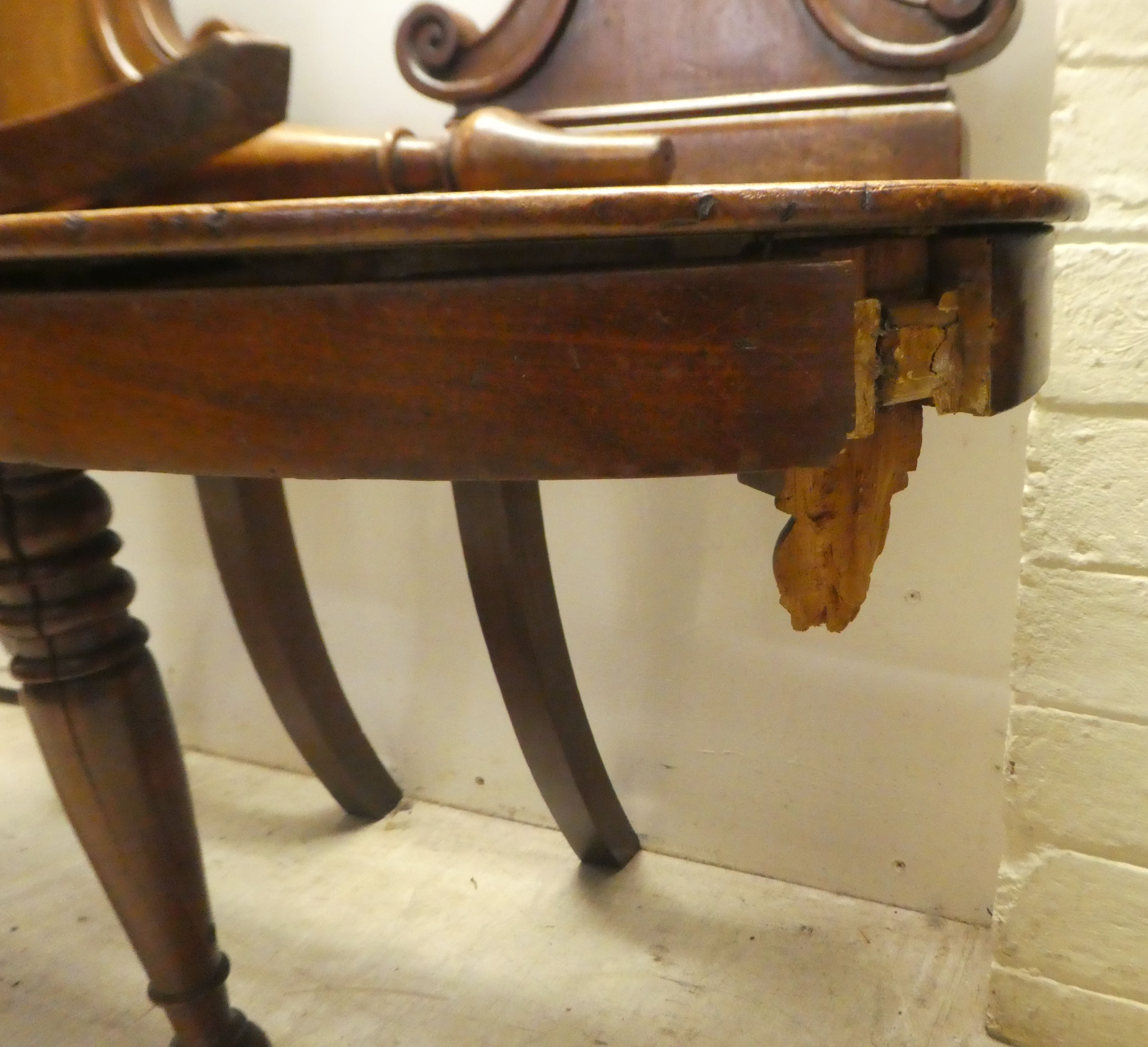 A pair of William IV mahogany hall chairs, the shell and twin C-scrolled back, over a solid seat, - Image 4 of 9