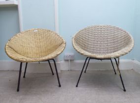 A pair of vintage rubberised cane work effect chairs, raised on cast metal legs