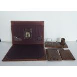 A modern crocodile skin effect desk set, comprising a desk tidy, a blotter, letter knife and folders