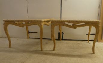 A pair of modern French hunting lodge style, naturally carved, bleached light oak lamp tables with