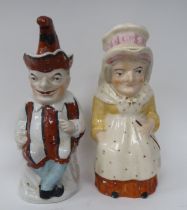 Two late Victorian Staffordshire pottery character jugs 'Punch' and 'Judy'  12"h