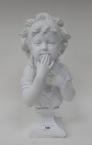 An early 20thC white glazed porcelain bust, a young girl  15"h