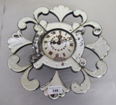 A mid 20thC Venetian design, mirrored panelled wall timepiece; the Garrard movement faced by a Roman