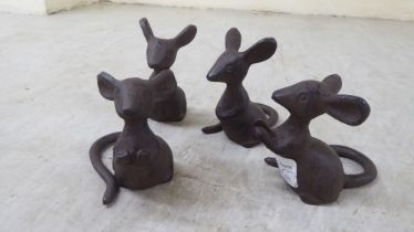 A set of four cast iron mice  3.5"L
