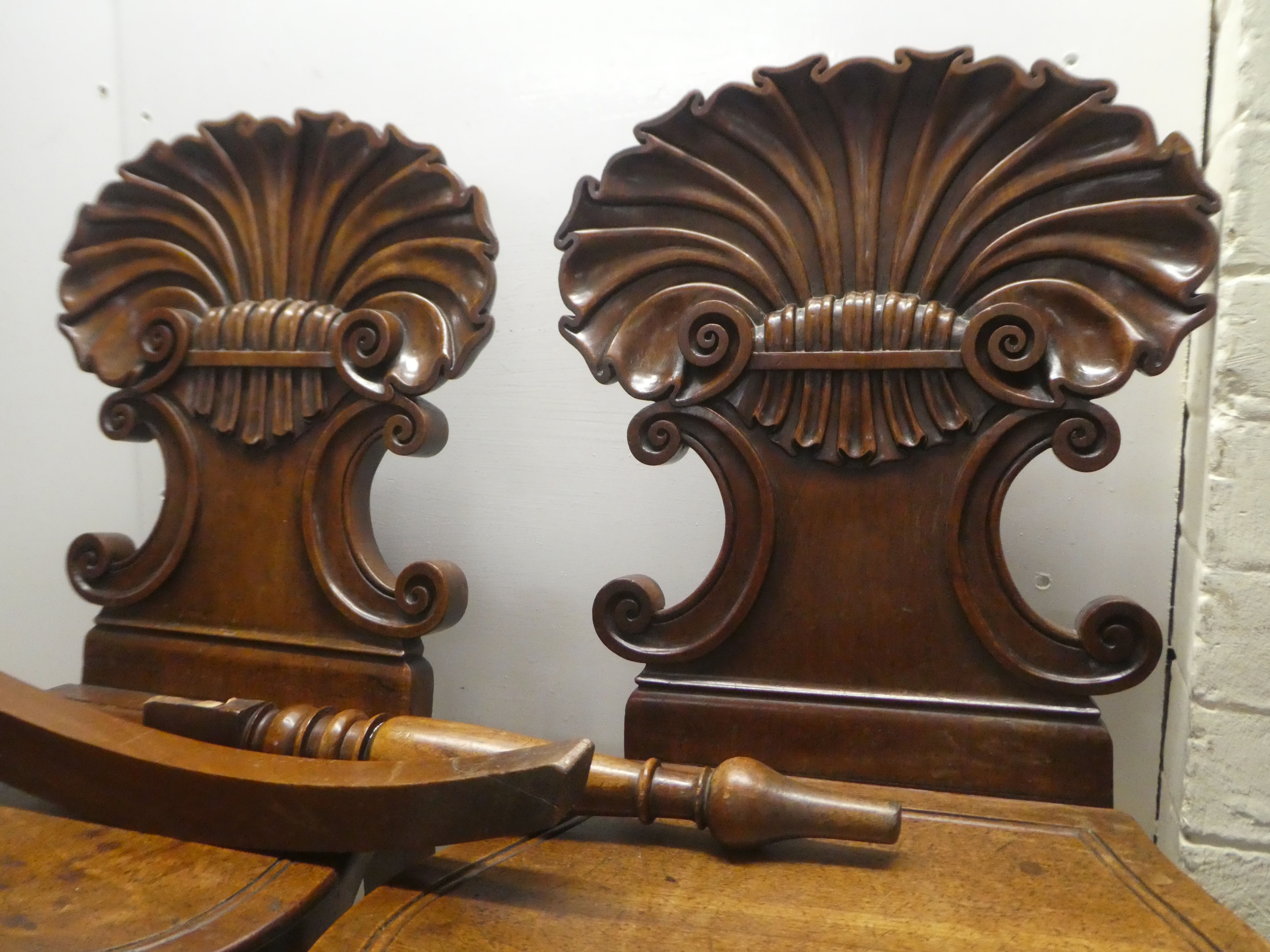 A pair of William IV mahogany hall chairs, the shell and twin C-scrolled back, over a solid seat, - Image 5 of 9