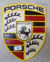 A painted cast iron sign 'Porsche'  9"w