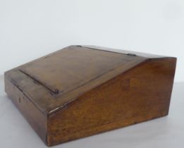 A late 19thC mahogany desk top bureau with a hinged lid  7"h  17"w  15"deep