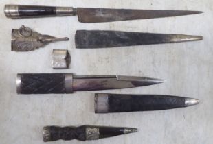 Three edged weapons: to include a dirk with a 6"L blade (Please Note: this lot is subject to the