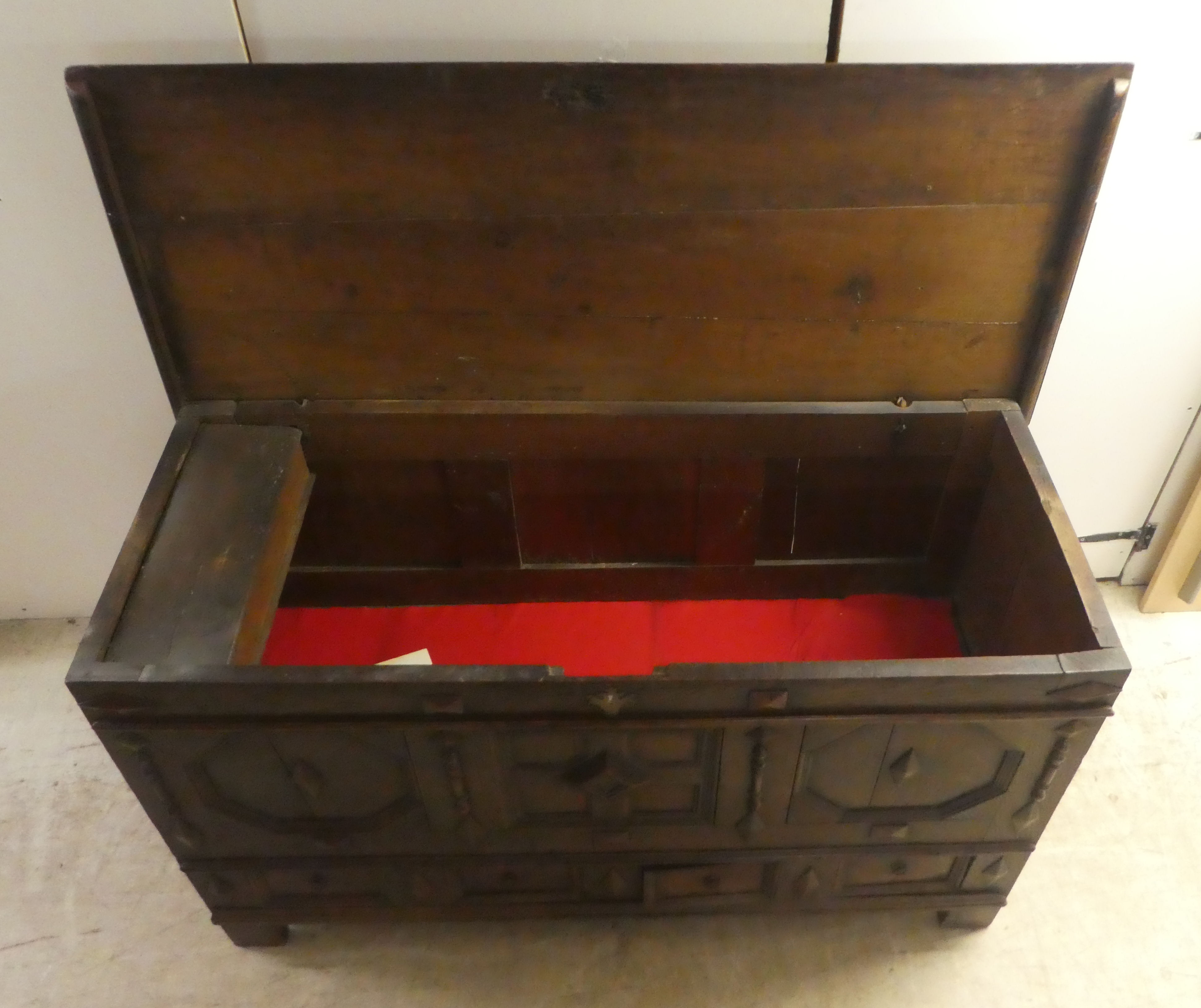 A late 18thC oak coffer with straight sides and a hinged lid, a panelled front and two drawers, - Image 5 of 6