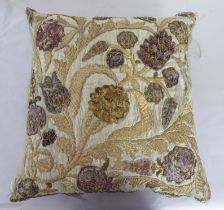 A 20thC foliate patterned embroidered scatter cushion with coloured threads