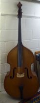 A double bass with a 49"L back