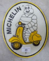 A painted cast iron sign 'Michelin'  8"dia