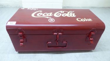 A painted metal hinged trunk, branded for Coca-Cola  9"h  19"w