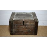 A vintage stained pine storage trunk.