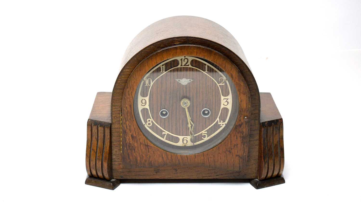 A Bentima dome-cased mantel clock.