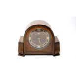 A Bentima dome-cased mantel clock.