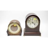 Two mantel clocks.
