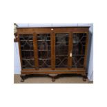 An early 20th Century carved mahogany bookcase,