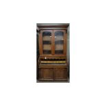 A Victorian mahogany cylinder bureau bookcase.