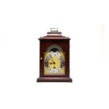 A German Hermle mantel clock.