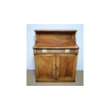 A Regency-style mahogany chiffonier.