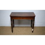 A Victorian mahogany tea table.