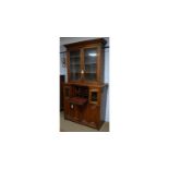 An Edwardian walnut bureau bookcase.