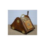 An Edwardian oak and brass mounted coal scuttle and shovel.