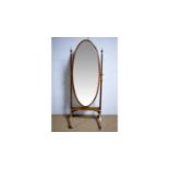 An early 20th Century mahogany cheval mirror.