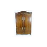 A substantial Breton carved oak armoire.