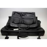 Two Tumi black leather bags, various.