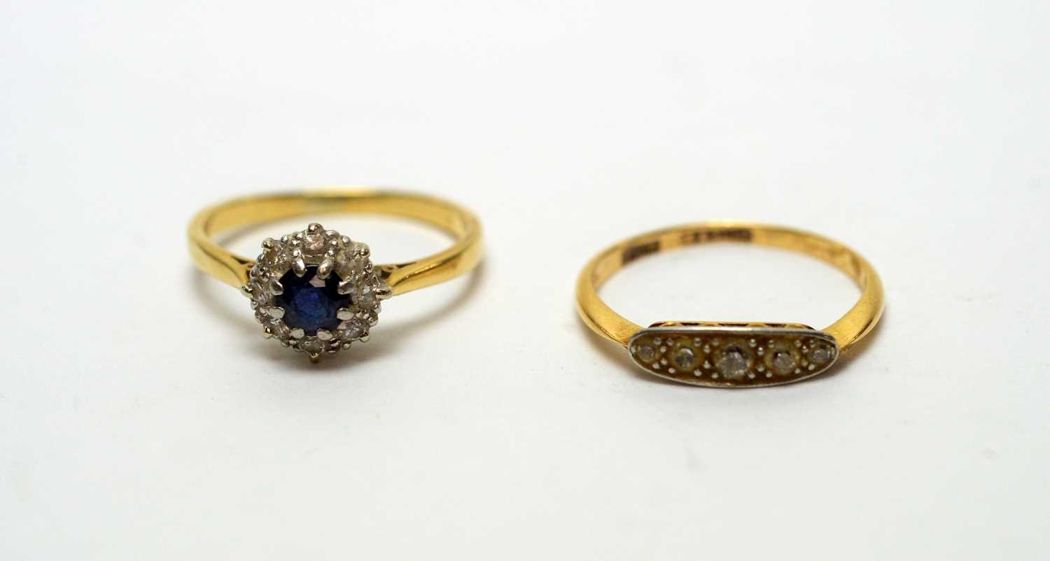 A sapphire and diamond cluster ring and another ring