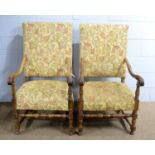 A pair of late 17th Century style carved walnut armchairs.