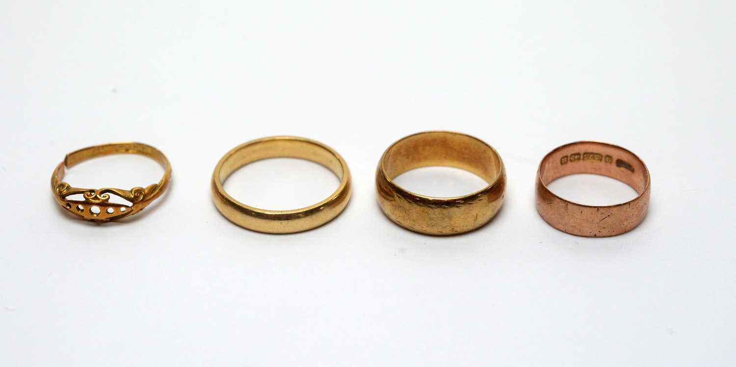Four gold rings