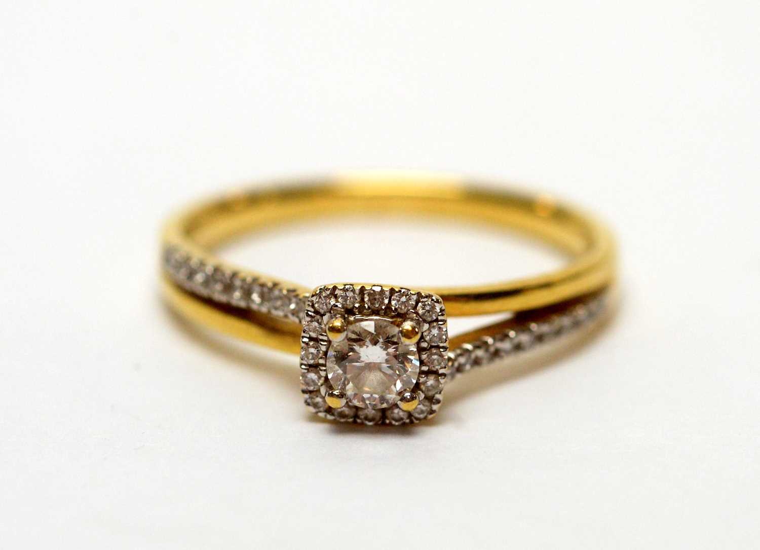 A diamond cluster ring,