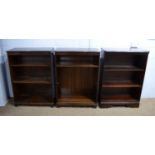 Three reproduction mahogany open bookcases various.