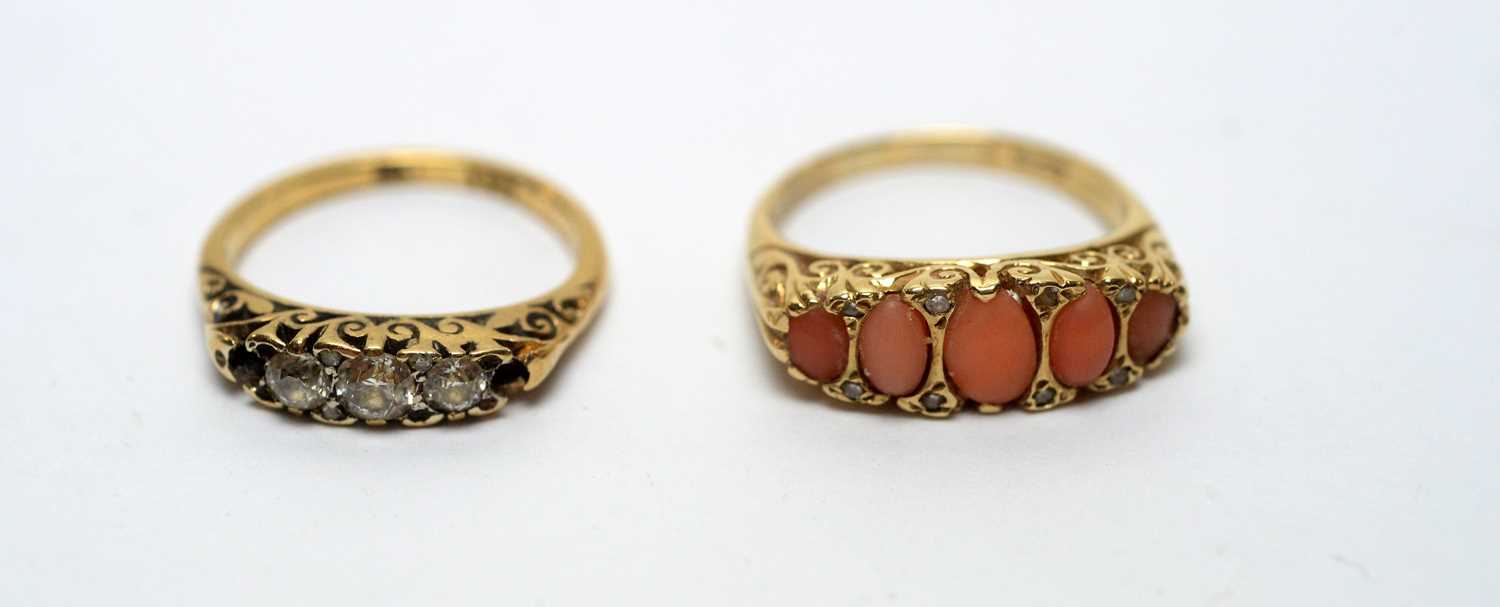 A diamond ring, and a coral ring,