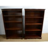 Two reproduction mahogany open bookcases.