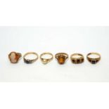 A selection of gold rings,