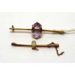 An amethyst brooch and an opal brooch