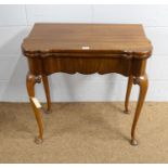 A Georgian-style mahogany card table.