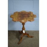 A Victorian burr walnut and walnut tripod table.