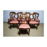 Simbeck of High Wycombe: A set of eight Victorian-style balloon back dining chairs.