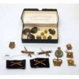 A selection of Military buttons and badges,