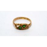 An emerald and diamond ring,