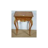 A Louis XV style parquetry and gilt-metal mounted side table.