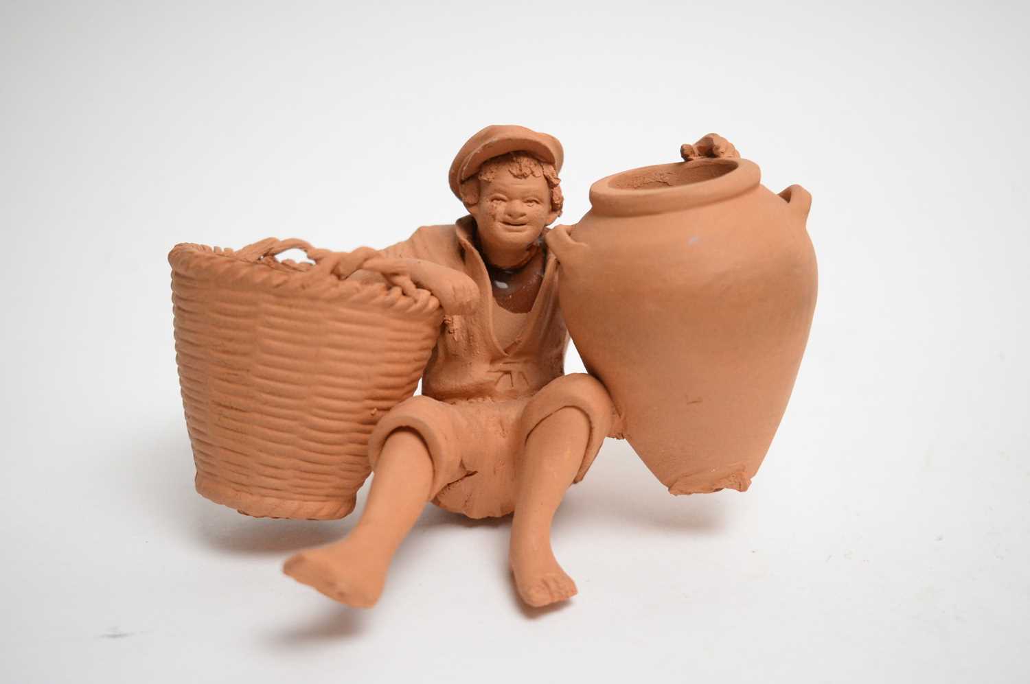 A selection of decorative ceramic wares and terracotta figures. - Image 10 of 20