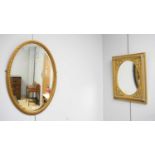 Two decorative wall mirrors.