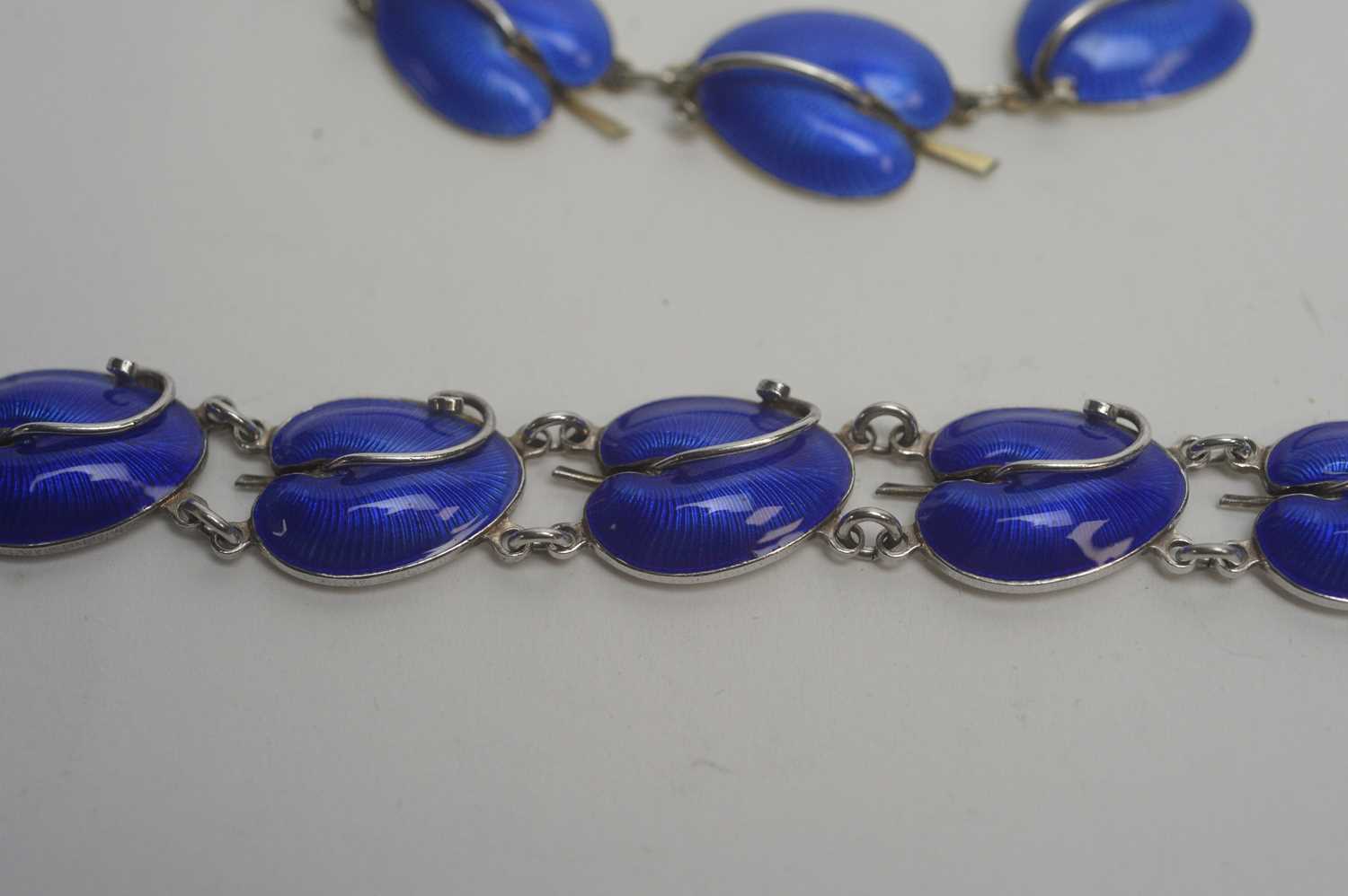 A silver and blue enamel bracelet and necklace. - Image 2 of 5