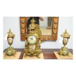 A Continental cast brass and Sevres style three-piece clock garniture by Lancini.